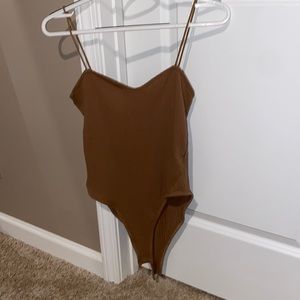 Brown body suit!